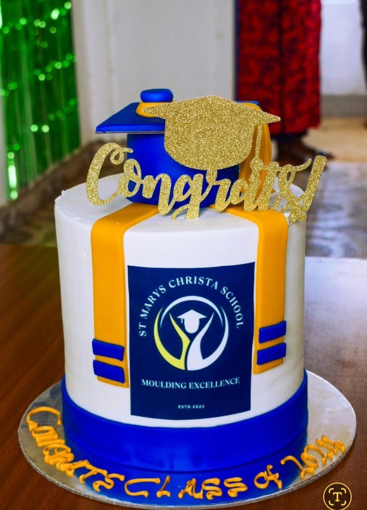 Graduation cake with the school logo